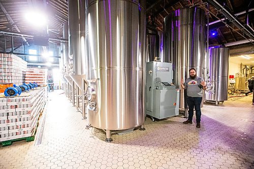 MIKAELA MACKENZIE / WINNIPEG FREE PRESS

Head of brewery operations Rob McWhinney shows the new CiCi Carbon Recapture System in their fermentation vat area at the Little Brown Jug brewery on Tuesday, Nov. 21, 2023. 
Winnipeg Free Press 2023.