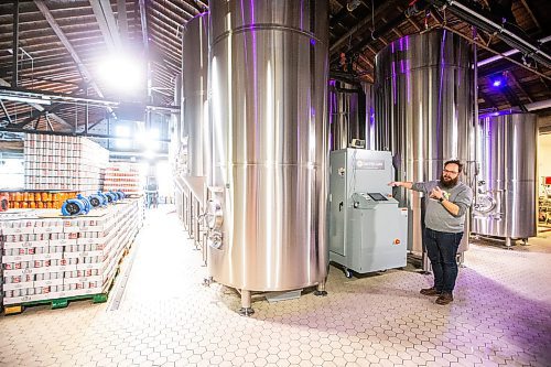 MIKAELA MACKENZIE / WINNIPEG FREE PRESS

Head of brewery operations Rob McWhinney shows the new CiCi Carbon Recapture System in their fermentation vat area at the Little Brown Jug brewery on Tuesday, Nov. 21, 2023. 
Winnipeg Free Press 2023.