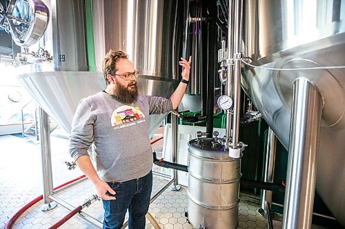 MIKAELA MACKENZIE / WINNIPEG FREE PRESS

Head of brewery operations Rob McWhinney shows a component of the new CiCi Carbon Recapture System in their fermentation vat area at the Little Brown Jug brewery on Tuesday, Nov. 21, 2023. 
Winnipeg Free Press 2023.