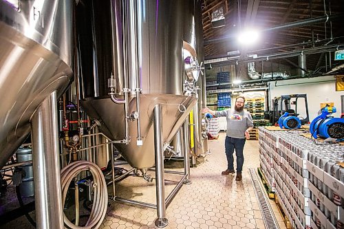 MIKAELA MACKENZIE / WINNIPEG FREE PRESS

Head of brewery operations Rob McWhinney talks about the new CiCi Carbon Recapture System in their fermentation vat area at the Little Brown Jug brewery on Tuesday, Nov. 21, 2023. 
Winnipeg Free Press 2023.