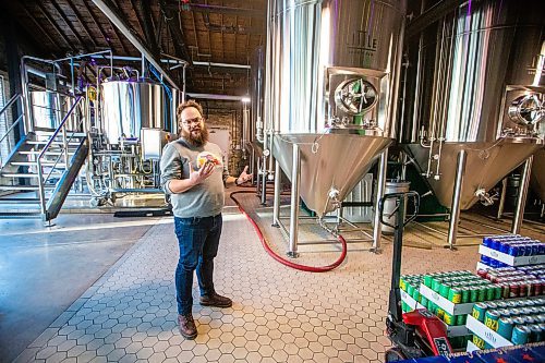 MIKAELA MACKENZIE / WINNIPEG FREE PRESS

Head of brewery operations Rob McWhinney talks about the new CiCi Carbon Recapture System in their fermentation vat area at the Little Brown Jug brewery on Tuesday, Nov. 21, 2023. 
Winnipeg Free Press 2023.