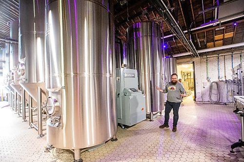 MIKAELA MACKENZIE / WINNIPEG FREE PRESS

Head of brewery operations Rob McWhinney shows the new CiCi Carbon Recapture System in their fermentation vat area at the Little Brown Jug brewery on Tuesday, Nov. 21, 2023. 
Winnipeg Free Press 2023.