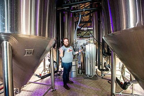 MIKAELA MACKENZIE / WINNIPEG FREE PRESS

Head of brewery operations Rob McWhinney shows components of the new CiCi Carbon Recapture System in their fermentation vat area at the Little Brown Jug brewery on Tuesday, Nov. 21, 2023. 
Winnipeg Free Press 2023.