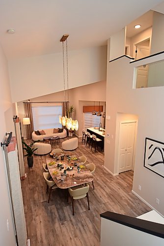 Todd Lewys / Winnipeg Free Press
The view down to the main living area in this large Transcona home is visually stunning.
