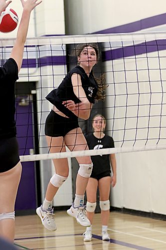 Mackenzie Lyburn hits a sharp cross-court shot during Vincent Massey Vikings varsity girls volleyball practice on Wednesday. The Vikings are off to the AAAA provincial quarterfinals on Saturday. (Thomas Friesen/The Brandon Sun)