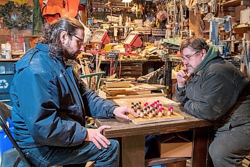 BROOK JONES / WINNIPEG FREE PRESS
Bill Gidzak and his son, Nick, turn out a variety of Christmas-themed wooden decorations and toys including snowman figurines.