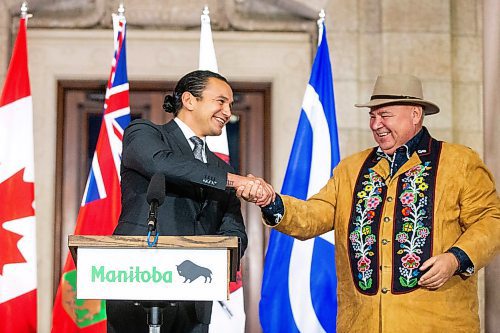 MIKAELA MACKENZIE / WINNIPEG FREE PRESS

Premier Wab Kinew (left) and MMF president David Chartrand shake hands as they announce the introduction of legislation naming Louis Riel as the honourary first premier of Manitoba at the legislative building on Thursday, Nov. 23, 2023. For Danielle story.
Winnipeg Free Press 2023.