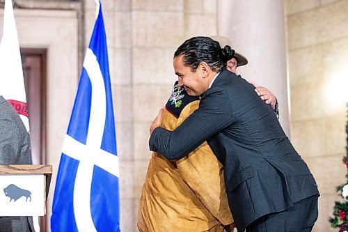 MIKAELA MACKENZIE / WINNIPEG FREE PRESS

MMF president David Chartrand (left) and premier Wab Kinew hug after they announced the introduction of legislation naming Louis Riel as the honourary first premier of Manitoba at the legislative building on Thursday, Nov. 23, 2023. For Danielle story.
Winnipeg Free Press 2023.