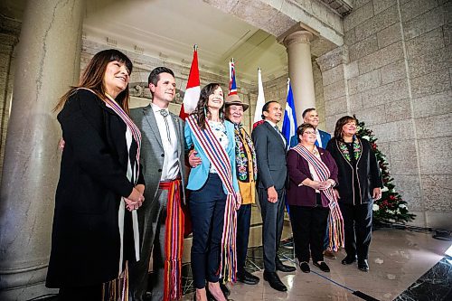 MIKAELA MACKENZIE / WINNIPEG FREE PRESS

Premier Wab Kinew poses for a photo with Metis MLAs, MMF representatives, and other dignitaries after announcing the introduction of legislation naming Louis Riel as the honourary first premier of Manitoba at the legislative building on Thursday, Nov. 23, 2023. For Danielle story.
Winnipeg Free Press 2023.