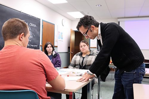 22112023
Brandon University Political Science instructor Chris Hunt (R) leads students from his Strategies of Major Powers class in a China-Taiwan Tensions Wargame on Wednesday evening. The wargame concludes next Wednesday evening. 
(Tim Smith/The Brandon Sun)