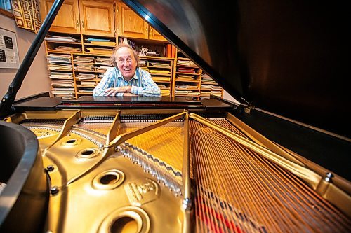 MIKAELA MACKENZIE / WINNIPEG FREE PRESS

John Melnyk with his signed Steinway piano on Thursday, Nov. 23, 2023. For Holly Harris story.
Winnipeg Free Press 2023.