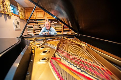 MIKAELA MACKENZIE / WINNIPEG FREE PRESS

John Melnyk with his signed Steinway piano on Thursday, Nov. 23, 2023. For Holly Harris story.
Winnipeg Free Press 2023.