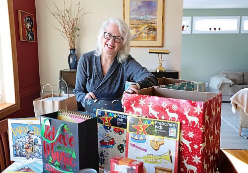 RUTH BONNEVILLE / WINNIPEG FREE PRESS

Christmas Cheer Board

Portrait of Carol Frampton with her open hampers she is beginning to fill on her dining room table Friday.  Carol Frampton  a longtime sponsor of the Feed-A-Family program and heads four different sponsorship groups. 

See story by Josh

Nov 24th,, 2023