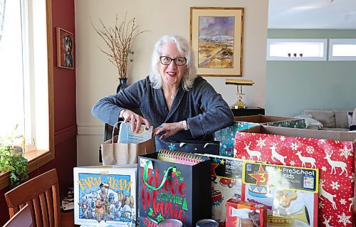 RUTH BONNEVILLE / WINNIPEG FREE PRESS

Christmas Cheer Board

Portrait of Carol Frampton with her open hampers she is beginning to fill on her dining room table Friday.  Carol Frampton  a longtime sponsor of the Feed-A-Family program and heads four different sponsorship groups. 

See story by Josh

Nov 24th,, 2023