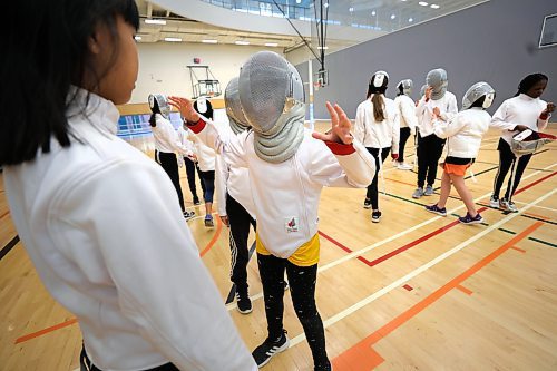 RUTH BONNEVILLE / WINNIPEG FREE PRESS

Standup - Girls learn fencing

Grade 5 student, Jadelyn, has some fun with her friend Anabel as they done their fencing helmets.  The girls took part in the Bison Transport Girls Multi-Sport Series at Sport Manitoba  Friday.  


Girls ages 7 - 12,  who were off school on an inservice day,  learn to fence with the help and instruction of coaches with the Manitoba Fencing Association at Sport Manitoba on Friday.  Fencing was one of 4 unique sports the girls participated in:  badminton, tennis, fencing, and taekwondo during the day long event.  

The Bison Transport Girls Multi-Sport Series gives girls ages 7-12 (birth years 2010-2016) of all backgrounds the chance to get active and try multiple different sports they may not have tried before. Each sport has instructors leading the way with experience and knowledge specific to their activity, ensuring everyone is learning, staying safe, and having fun! 

See website link for more details.
 
Nov 24th,, 2023