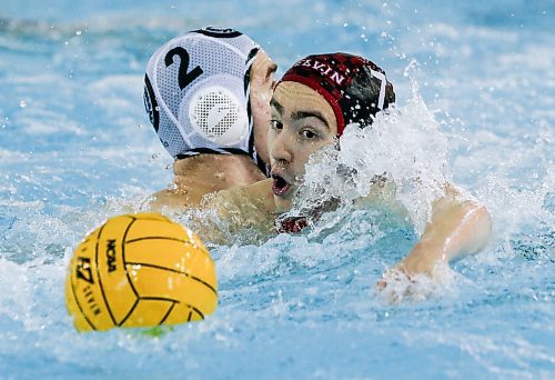 JOHN WOODS / WINNIPEG FREE PRESS
Kelvin High School&#x2019;s Charlie Omalley (7) and Vincent Massey Collegiate&#x2019;s Henry Suffield (2) chase down a ball  in the Manitoba Schools Water Polo League gold medal game at the Pan Am pool in Winnipeg Sunday, November  26, 2023. Vincent Massey went on to win the championship game.

Reporter: Josh