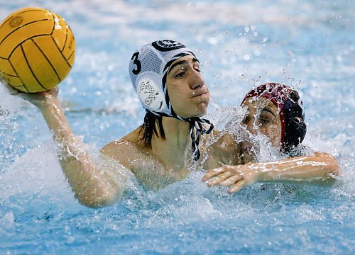 JOHN WOODS / WINNIPEG FREE PRESS
Kelvin High School&#x2019;s Jacob Carranza (4) defends as Vincent Massey Collegiate&#x2019;s Lex Mackin (3) takes the shot in the Manitoba Schools Water Polo League gold medal game at the Pan Am pool in Winnipeg Sunday, November  26, 2023. Vincent Massey went on to win the championship game.

Reporter: Josh