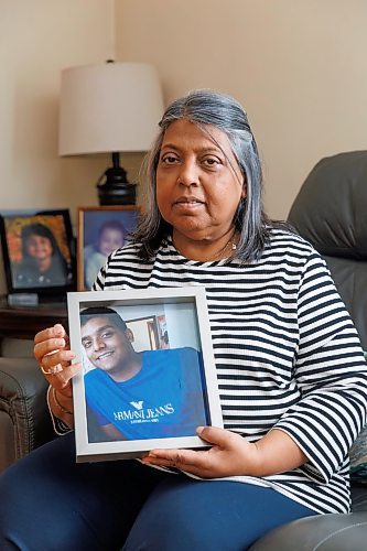 MIKE DEAL / WINNIPEG FREE PRESS
Chandra Sankar, the mother of Michael Sankar, holds a photo of her son who died in August during an interaction with the WPS. 
See Marsha McLeod story
231127 - Monday, November 27, 2023.