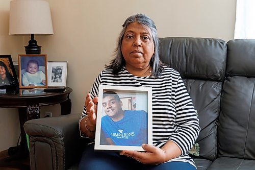 MIKE DEAL / WINNIPEG FREE PRESS
Chandra Sankar, the mother of Michael Sankar, holds a photo of her son who died in August during an interaction with the WPS. 
See Marsha McLeod story
231127 - Monday, November 27, 2023.