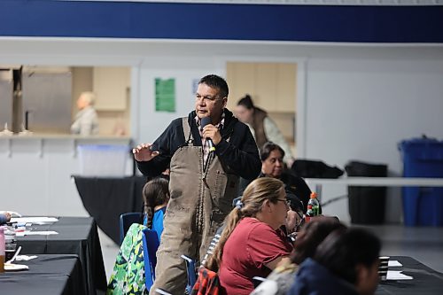 A man named Travis, who identified himself as a community safety officer, speaks during a meeting at Sioux Valley Dakota Nation's Veterans Hall on Monday evening. The meeting was to discuss a new law that allows for the banishment of people judged to be a serious threat to the community. (Colin Slark/The Brandon Sun)