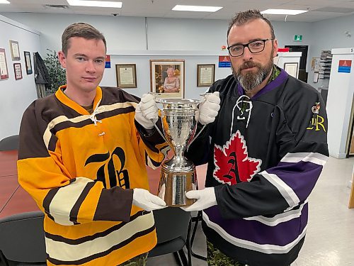 B Battery Commander Maj Craig Kelsey (left) and A “The Queen’s” Battery Commander Maj Chris Lewington hold the just polished Kingston Cup at the RCA Museum. The winning major will hoist the trophy Dec. 4 once a winner is decided during the early morning hockey tilt at Gunner Arena.
(Photo by Jules Xavier/The Brandon Sun)