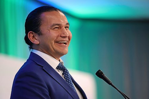 Manitoba Premier Wab Kinew laughs during a speech to delegates at the Association of Manitoba Municipalities conference at the Keystone Centre in Brandon on Tuesday afternoon. (Matt Goerzen/The Brandon Sun)