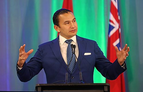 Manitoba Premier Wab Kinew gestures during a speech to delegates at the Association of Manitoba Municipalities conference at the Keystone Centre in Brandon on Tuesday afternoon. (Matt Goerzen/The Brandon Sun)