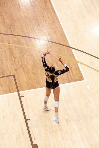 BROOK JONES / WINNIPEG FREE PRESS
University of Manitoba Bisons left side Raya Surinx looking up at the volleyball as she delivers a jump spin serve during the third set against the visiting Mount Royal Cougars in Canada West women's volleyball action inside Investors Group Athletic Centre at the University of Manitoba Fort Garry campus in Winnipeg, Man., Friday, Nov. 17, 2023. The Bisons earned a 3-0 (25-13, 25-19, 25-21) victory over the Cougars.
