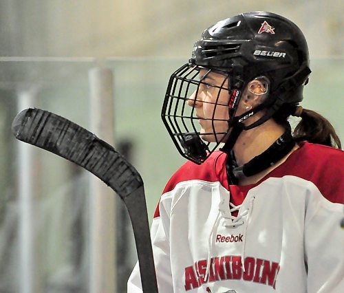 A study in concentration, Birtle's Payton Malchuk watches her team's breakout drills on the bench during a Tuesday night AAC Cougars practice at Flynn Arena.
(Photos by Jules Xavier/The Brandon Sun)