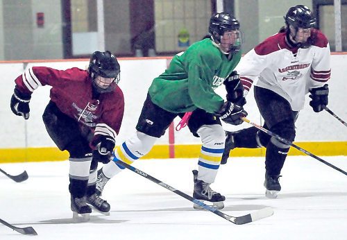 Rookie forward Billie Baranyk (green) does wind sprints at Flynn Arena during an ACC Cougars evening practice with teammates Pandora Turcotte of Oakbank (left) and Birtle's Payton Malchuk.
(Photos by Jules Xavier/The Brandon Sun) 