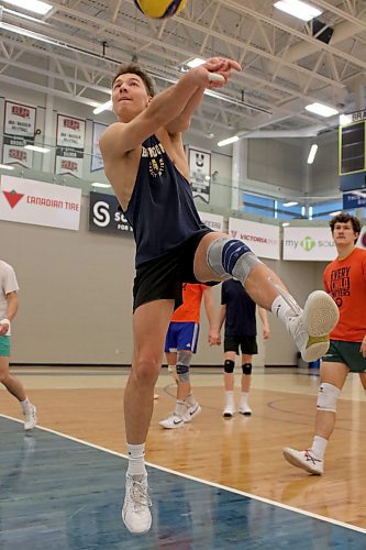 Paycen Warkentin passes a ball during BU men's volleyball practice on Thursday. (Thomas Friesen/The Brandon Sun)