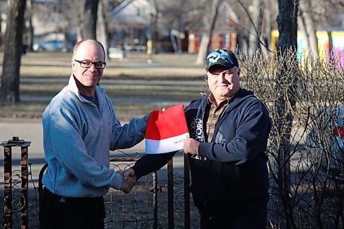 L-R: Brandon Santa Parade longtime organizer Karlheinz Sawatzky-Dyck passed the reins to Westman & Area Traditional Christmas Dinner chair Gladden Smith on Friday. Sawatzky-Dyck says the eagerness and organizational prowess of the incoming team affirmed their readiness to take charge. Photos: (Abiola Odutola/The Brandon Sun)