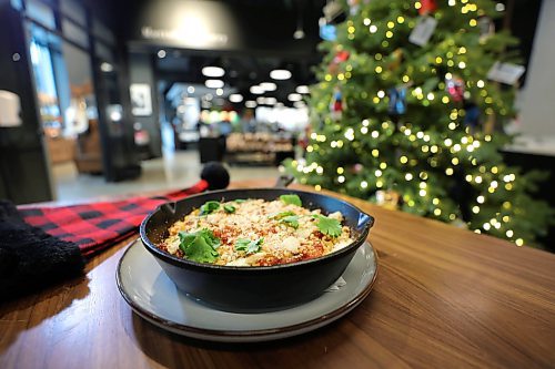 RUTH BONNEVILLE / WINNIPEG FREE PRESS

ENT -  Christmas Side Dishes
Mottola Grocery

Story: Christmas Side Dishes
Five chefs share their favourite Christmas side dishes. 

Featuring,  Jesse Friesen&#x2019;s Baked Corn Salsa, Mottola Grocery. 

Feature by AV Kitching 

Nov 28th,, 2023