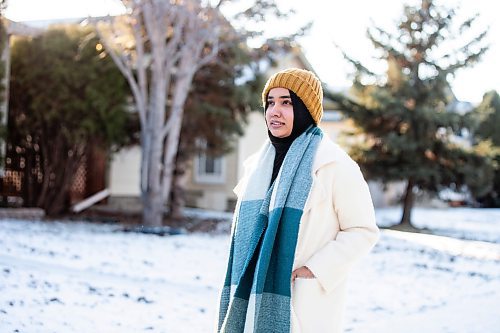 MIKAELA MACKENZIE / WINNIPEG FREE PRESS

Maliha Tauqeer, who immigrated to Winnipeg from Patna, India, in 2022, poses for a photo outside on Friday, Dec. 1, 2023. At first she was excited for winter, but soon realized that she experiences seasonal blues with the cold, dark season.
Winnipeg Free Press 2023
