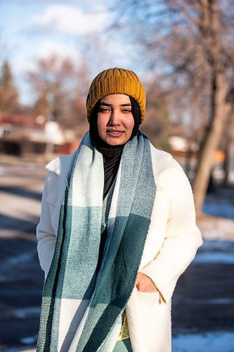 MIKAELA MACKENZIE / WINNIPEG FREE PRESS

Maliha Tauqeer, who immigrated to Winnipeg from Patna, India, in 2022, poses for a photo outside on Friday, Dec. 1, 2023. At first she was excited for winter, but soon realized that she experiences seasonal blues with the cold, dark season.
Winnipeg Free Press 2023