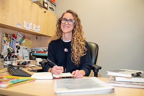 BROOK JONES / WINNIPEG FREE PRESS
St. James-Assinniboia Public Library branch head librarian Stephanie George is pictured smiling while working at a desk in her office on the main floor of the local library in Winnipeg, Man., Tuesday, Nov. 7, 2023.