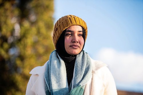 MIKAELA MACKENZIE / WINNIPEG FREE PRESS

Maliha Tauqeer, who immigrated to Winnipeg from Patna, India, in 2022, poses for a photo outside on Friday, Dec. 1, 2023. At first she was excited for winter, but soon realized that she experiences seasonal blues with the cold, dark season.
Winnipeg Free Press 2023