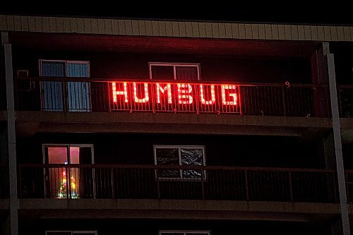 Mike Sudoma / Winnipeg Free Press
Sidney (Sid) Farmer&#x2019;s infamous &#x201c;Humbug&#x201d; light display which shines bright from his former apartment&#x2019;s balcony which faces the Route 90 underpass near Polo Park
December 20, 2021 