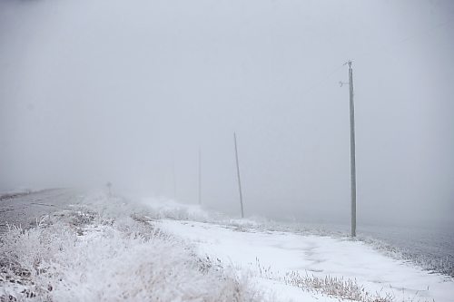 MIKAELA MACKENZIE / WINNIPEG FREE PRESS

Frosty rural power lines disappear into the fog near Morris on Monday, Dec. 4, 2023. For JS hydro story.
Winnipeg Free Press 2023