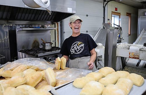 RUTH BONNEVILLE / WINNIPEG FREE PRESS

INTERSECTION - St.Pierre Bakery

Photo of staff, Theresa Tanner, sharing some laughs while packaging up ciabatta buns.  

Joe Gagne, owner Boulangerie St-Pierre Bakery, in  St-Pierre-Jolys (about 30 minutes south of the Mint) 

Story: This is for an Intersection piece on the St-Pierre Bakery, which has been cranking out loaves of bread, cinnamon buns and tourtiere for close to a century. 

Joe, the present owner, took over from his parents a few years ago; his dad started working there in the '80s, and bought the bakery in 1992 (owner previous to the Gagnes, a fellow named Norm, had it from the mid-60s to the early '90s, 
(Photo of all three in the original building with staff working in the background)

They turn out as many as 1,800 loaves of bread an hour, it's a hopping place. Also photos of pastries, storefront - customers, workers and outside shot of building.  


See Dave's story. 

Dec 5th,  2023