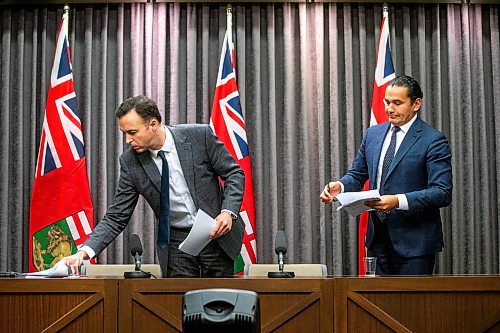 MIKAELA MACKENZIE / WINNIPEG FREE PRESS

Finance minister Adrien Sala (left) and premier Wab Kinew gather their papers after speaking to the media about the finances left to them by the previous conservative government at the Manitoba Legislative Building on Tuesday, Dec. 5, 2023. For Danielle story.
Winnipeg Free Press 2023