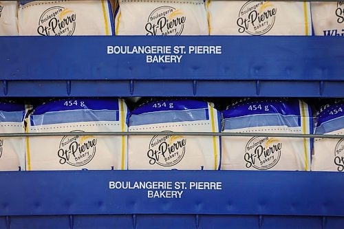 RUTH BONNEVILLE / WINNIPEG FREE PRESS

INTERSECTION - St.Pierre Bakery

Photo of loaves of bread staked on trays with name on packaging. 

Joe Gagne, owner Boulangerie St-Pierre Bakery, in  St-Pierre-Jolys (about 30 minutes south of the Mint) 

Story: This is for an Intersection piece on the St-Pierre Bakery, which has been cranking out loaves of bread, cinnamon buns and tourtiere for close to a century. 

Joe, the present owner, took over from his parents a few years ago; his dad started working there in the '80s, and bought the bakery in 1992 (owner previous to the Gagnes, a fellow named Norm, had it from the mid-60s to the early '90s, 
(Photo of all three in the original building with staff working in the background)

They turn out as many as 1,800 loaves of bread an hour, it's a hopping place. Also photos of pastries, storefront - customers, workers and outside shot of building.  


See Dave's story. 

Dec 5th,  2023