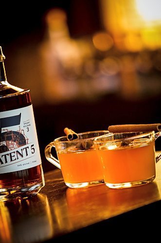 JOHN WOODS / WINNIPEG FREE PRESS
Patent 5 Distillery bar manager Nick Drescher has developed a spiced cider drink for the Christmas season and mixed it up in the Alexander Avenue bar Tuesday, December 5, 2023. 

Reporter: eva