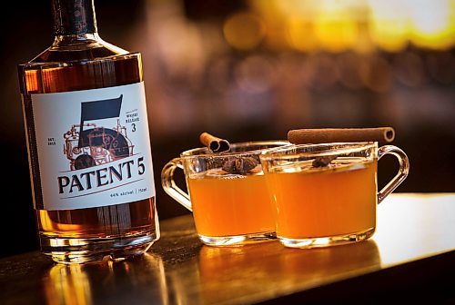 JOHN WOODS / WINNIPEG FREE PRESS
Patent 5 Distillery bar manager Nick Drescher has developed a spiced cider drink for the Christmas season and mixed it up in the Alexander Avenue bar Tuesday, December 5, 2023. 

Reporter: eva