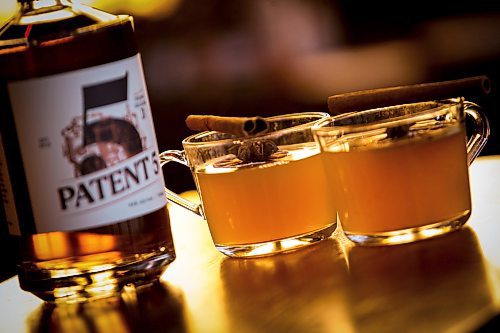 JOHN WOODS / WINNIPEG FREE PRESS
Patent 5 Distillery bar manager Nick Drescher has developed a spiced cider drink for the Christmas season and mixed it up in the Alexander Avenue bar Tuesday, December 5, 2023. 

Reporter: eva