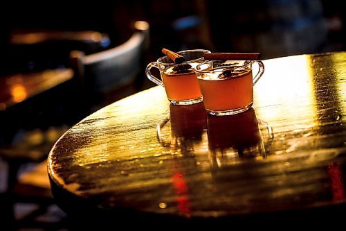 JOHN WOODS / WINNIPEG FREE PRESS
Patent 5 Distillery bar manager Nick Drescher has developed a spiced cider drink for the Christmas season and mixed it up in the Alexander Avenue bar Tuesday, December 5, 2023. 

Reporter: eva