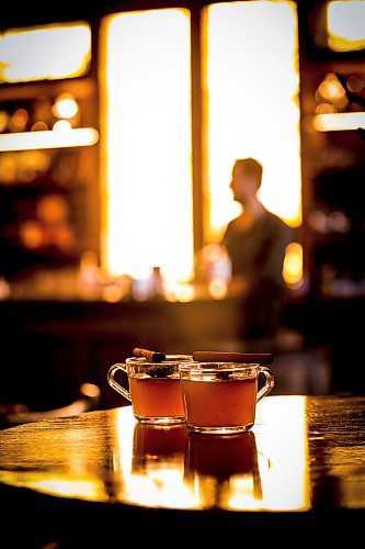 JOHN WOODS / WINNIPEG FREE PRESS
Patent 5 Distillery bar manager Nick Drescher has developed a spiced cider drink for the Christmas season and mixed it up in the Alexander Avenue bar Tuesday, December 5, 2023. 

Reporter: eva