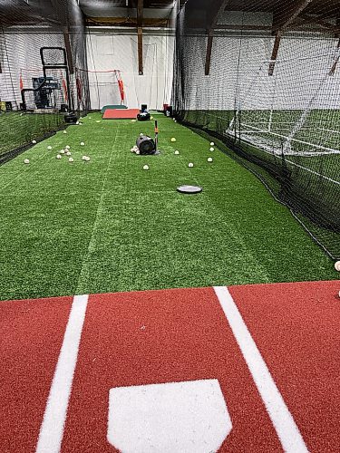 One of the advantages of the newly opened TC Indoor Sports Facility for local baseball and softball pitchers is the ability throw full bullpens to live hitters. (Perry Bergson/The Brandon Sun)