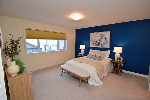 Todd Lewys / Winnipeg Free Press
The primary bedroom is a spacious, secluded sanctuary.