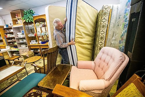 MIKAELA MACKENZIE / WINNIPEG FREE PRESS

Dave Wiebe shows the mattresses, which are typically the first thing that Ukrainian newcomers take, in Winnipeg on Tuesday, Dec. 5, 2023. For faith story.
Winnipeg Free Press 2023